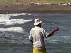 MS Man fishing with handline in Nosara river mouth / Guanacaste, Costa Rica Stock Footage