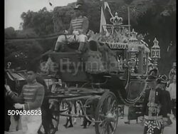 1940: REAFFIRMING TIES: Sultan ceremony (Dutch Crown & Royal House of Orange) parade w/ musicians, ornate carriage through street, Indonesian soldiers standing at attention, Indonesians in costume, young sultan standing w/ male in military uniform. Instructional Video