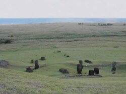 WS PAN View of Moai statue near ocean / Rapa Nui National Park, Easter Island, Chile  Stock Footage