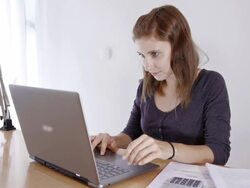 Young Woman Studying On Laptop Stock Footage