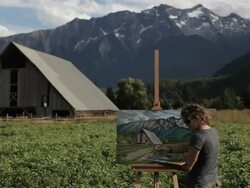 women painting mtn landscape with barn Stock Footage