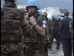 Bosnia - UN Peacekeepers' Bodies Onto Chopper News Clip