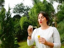 Woman Blowing Bubbles Stock Footage
