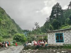 T/L Bus Queue in Tatopani, Himalayas Stock Footage