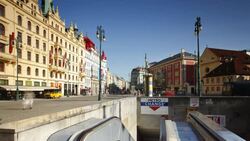 Commuters ride up an escalator from the underground metro in Prague. Stock Footage