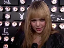 INTERVIEW - Andrea Horblitt talks about being at the Bud Light Hotel, her first time at Superbowl party at the 60th Anniversary Playboy Party, Bud Light Hotel Stock Footage