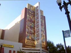 OAKLAND, CALIFORNIA: Angled WS EXT Paramount Theater w/ artwork on both sides of marquee. Stock Footage