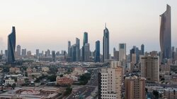 Arabian Peninsula, Kuwait, Kuwait City, Elevated day to night transition over the city centre Stock Footage