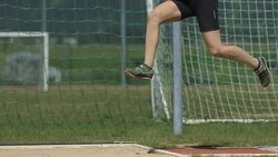 HD Super Slow-Mo: Young Woman Training A Long Jump Stock Footage