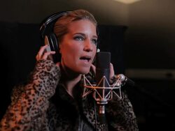 Female performing in recording studio Stock Footage