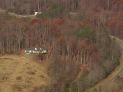 WS AERIAL ZI View of house surrounding trees / North Carolina, United States Stock Footage