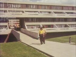 Living at Thamesmead, 1973, part 6 - Boy and girl walk around Thamesmead Estate Stock Footage