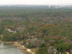 WS AERIAL View of Jockey's Ridge State Park with lake/ North Carolina, United States Stock Footage