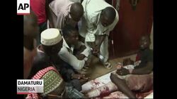 A suicide bomber detonated explosives packed into a tricycle taxi at an outdoor World Cup viewing site in northeast Nigerian. (June 18) Instructional Video