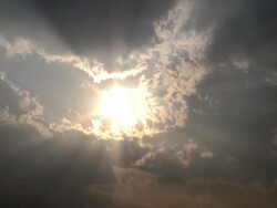 Sun in dramatic sky Stock Footage
