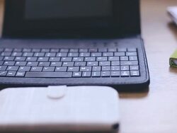 Office supplies and gadgets on wooden table Stock Footage