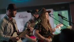 Bearded country rock band play in Austin bar during South By Southwest music festival Stock Footage
