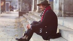 Hipster waiting on the stairs. Stock Footage