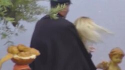 Vatican guards restrain Femen activists as they protest in front of nativity scene News Clip