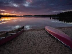 Canoes at the beach Stock Footage
