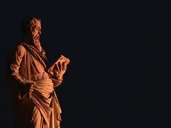 A statue of Nostradamus stands against a black background. Stock Footage