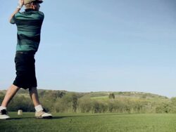 Golfer hits solid drive, shot in HD. Stock Footage