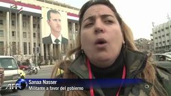 VOICED: Siria vota nueva Constitucion en clima de violencia News Clip