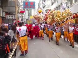 MS ZO Lion dance performance on street on Chinese New Year AUDIO / Hong Kong, Special Administrative Region, China Stock Footage