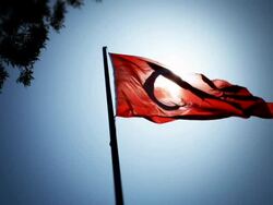 National flag of Turkey against blue sky Stock Footage