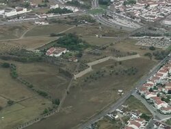 AERIAL WS Townscape with fort / Evora, Portugal Stock Footage