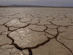  WS Landscape with wet cracks on arid desert / Mojave, California, USA Stock Footage