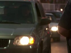 Customs agents check documents of drivers crossing US-Mexico border Stock Footage