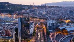 Elevated dusk view over Barcelona city centre, Catalunya, Spain - Time lapse Stock Footage