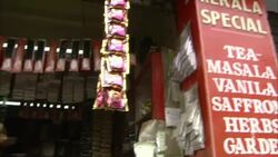 Jarred spices line shelves at a market in India. Stock Footage