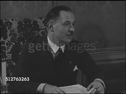 1947: PARIS, FRANCE: Gaullist Party (RPF) founder Gaston Palewski talking w/ Inspector of Finance Andre Diethelm in office. Propaganda Chief Andre Malraux at desk talking w/ unidentified man & Georges Catroux (R). MS Georges Catroux. Instructional Video