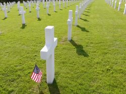 MS HA View of American war cemetery site and country flag / Sandweiler, Luxembourg Stock Footage