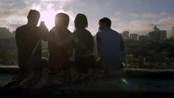 Group of friends hug and take smartphone photos overlooking Austin, Texas Stock Footage