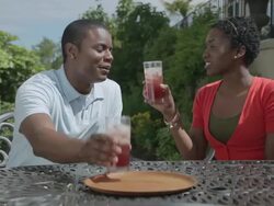MS Couple drinking juice in back yard  / Portland, Oregon, United States  Stock Footage