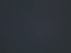 hotel resort getaway lodge bedroom bed sheets woman maid housekeeper making bed Stock Footage