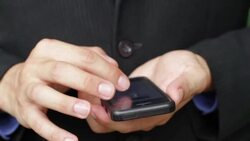 Businessman using mobile phone Stock Footage