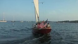 An elderly man and his crew sails their Morris Yachts M42 through Narragansett Bay near Newport. Stock Footage