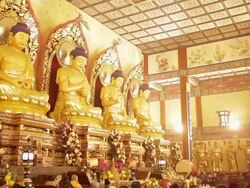 MS TD Shot of Monks and buddhists pray inside temple / Xi'an, Shaanxi, China Stock Footage