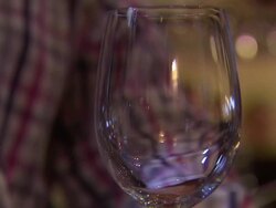 Glass of White Wine Being Poured News Clip
