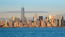 Statue of Liberty, One World Trade Center and Downtown Manhattan across the Hudson River, New York, Manhattan, United States of America - Time lapse Stock Footage