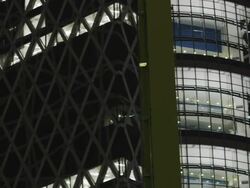 MS PAN New mode tower in evening / Tokyo, Tokyo-to, Japan   Stock Footage