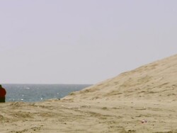 MS Shot of Desert and people gathering near sea area / Doha, Qatar Stock Footage