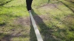 Walking on rope,human legs ,close up Stock Footage