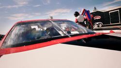 Stock car pit-crew refuels and jacks race-car Stock Footage
