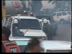 Clashes as police forcibly remove cab and bus drivers blocking roads News Clip