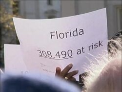 Dozens of clergy along with scores of congregants went to the Treasury Building next to the White House to pray to God to help solve the country's dire financial situation. News Clip